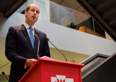 Prince William at a podium at a London museum
